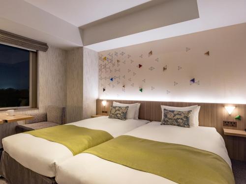 Habitación Doble Deluxe - 2 camas del hotel Tokyu Stay Kanazawa. Foto 6
