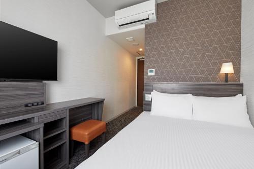 Habitación Doble - No fumadores del hotel Sotetsu Fresa Inn Osaka Shinsaibashi. Foto 13