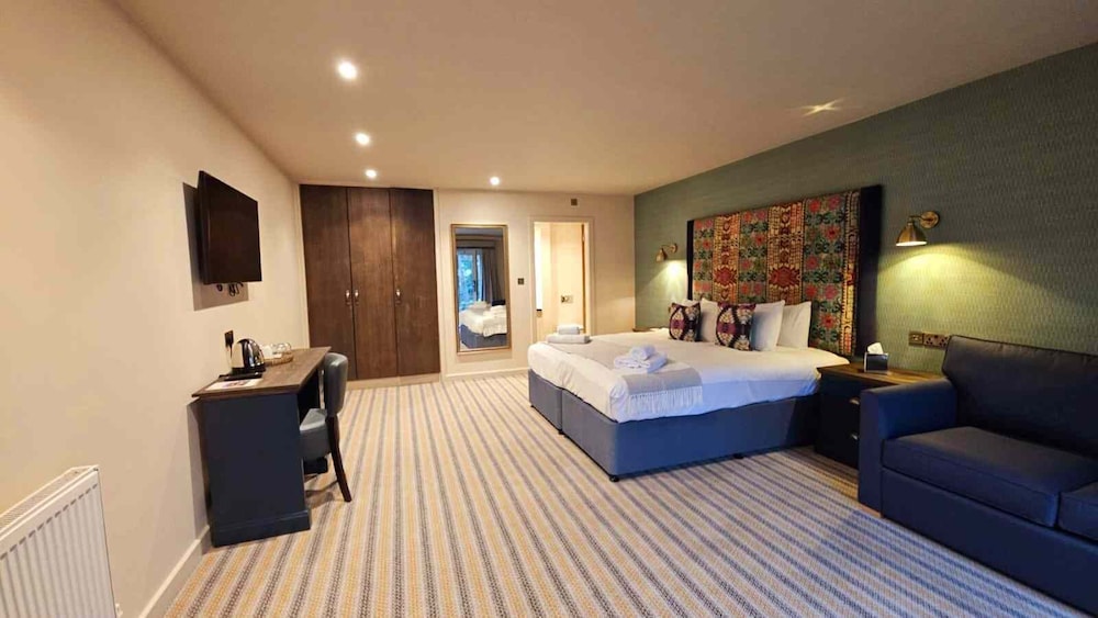 Habitación familiar del hotel The Great Hallingbury Manor. Foto 2