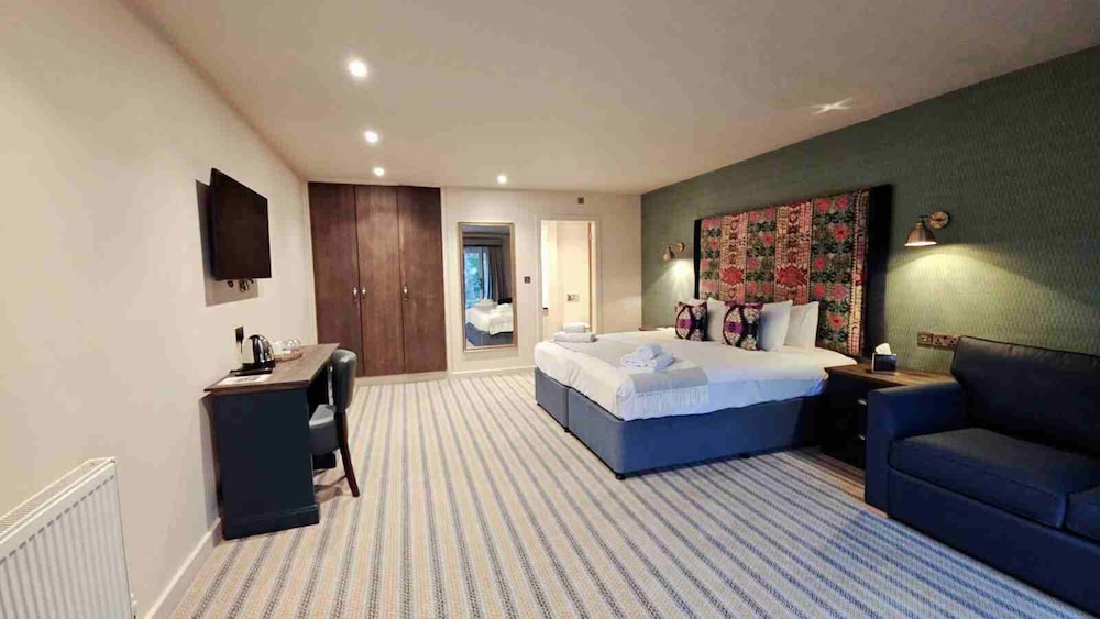 Habitación familiar del hotel The Great Hallingbury Manor. Foto 3