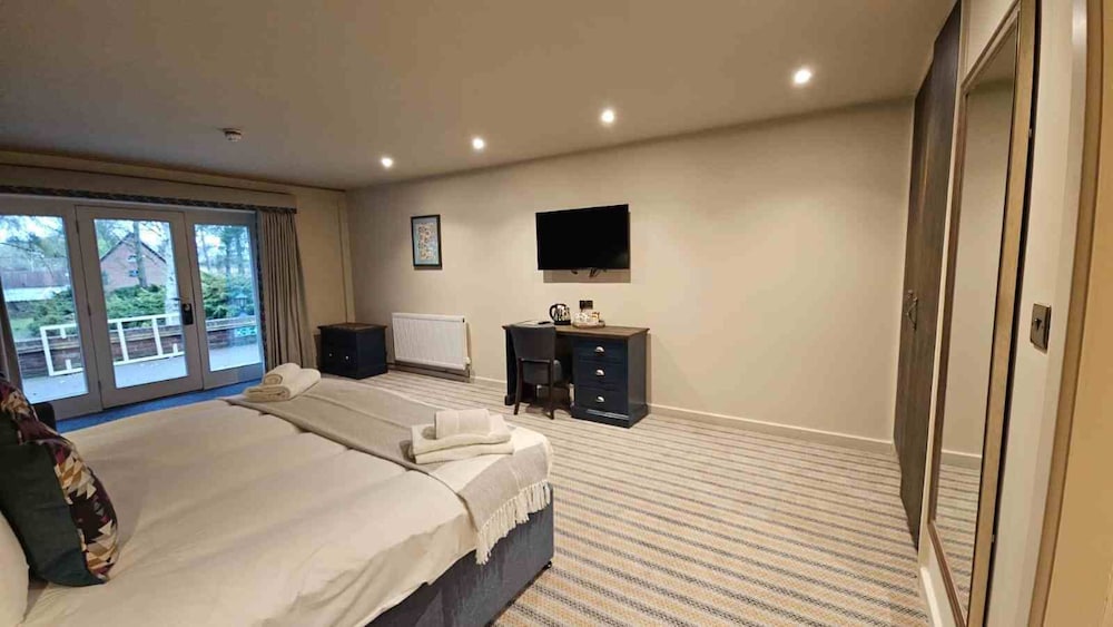 Habitación familiar del hotel The Great Hallingbury Manor. Foto 6