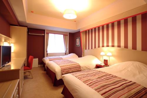 Habitación Triple del hotel Monterey Kyoto. Foto 2