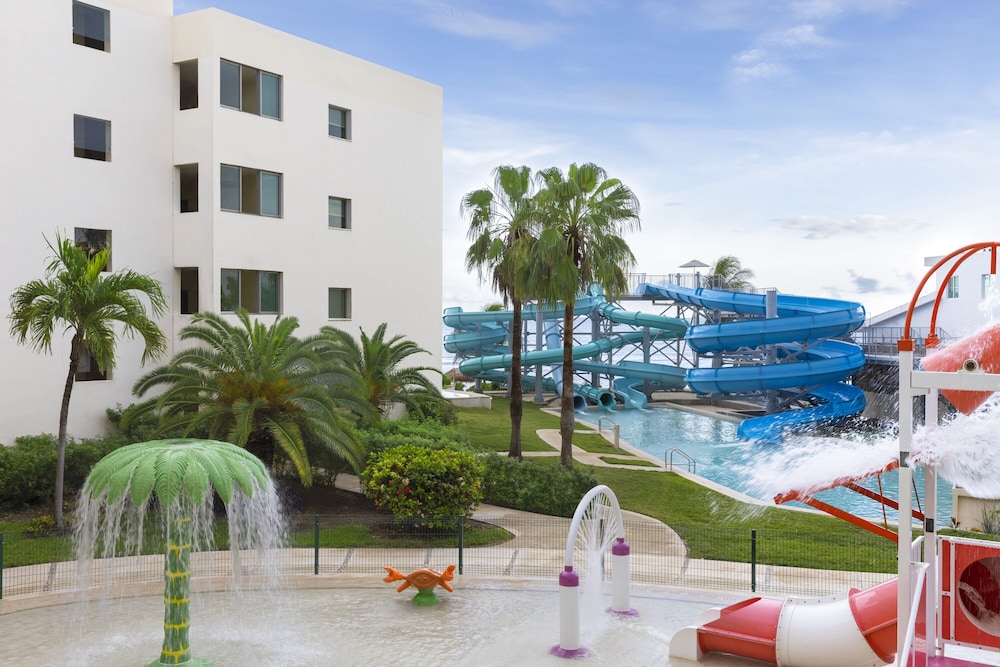 Junior Suite Water Park View King del hotel Dreams Puerto Morelos Resort & Spa - All Inclusive. Foto 4