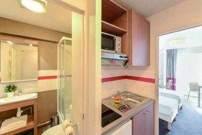 Estudio con 2 camas individuales del hotel Appart'city Classic Paris La Villette. Foto 2