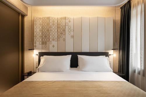 Habitación Deluxe del hotel Áurea Palacio De Correos By Eurostars Company. Foto 3