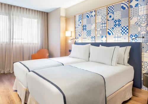 Habitación Doble con aparcamiento del hotel Eurostars Guadalquivir. Foto 1