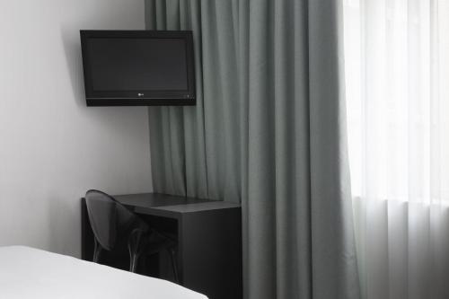 Habitación (1 o 2 adultos) - 1 o 2 camas del hotel Petit Palace Plaza Mayor. Foto 1