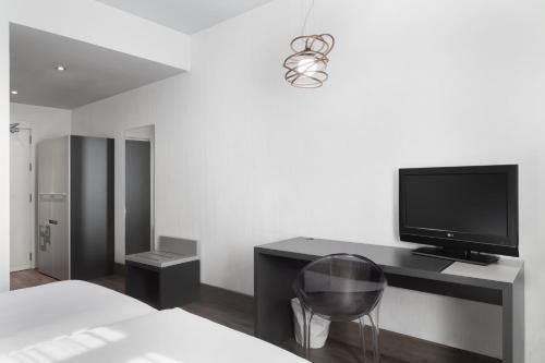 Habitación (1 o 2 adultos) - 1 o 2 camas del hotel Petit Palace Plaza Mayor. Foto 4