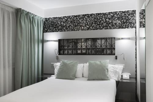 Habitación Doble Pequeña del hotel Petit Palace Plaza Mayor. Foto 5