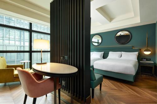 Habitación Doble Deluxe - 2 camas dobles del hotel Hilton Rome Eur La Lama