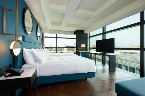 Habitación Executive esquinera - 2 camas dobles del hotel Hilton Rome Eur La Lama
