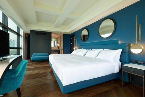 Habitación Executive esquinera - 2 camas dobles del hotel Hilton Rome Eur La Lama. Foto 1
