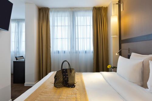 Habitación Triple del hotel Simon's Boutique
