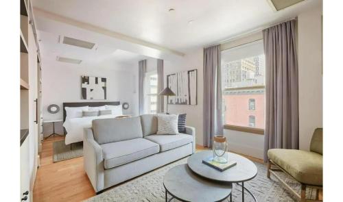 Habitación Deluxe con 1 cama extragrande y sofá cama - No fumadores del hotel Duane Street Hotel. Foto 11