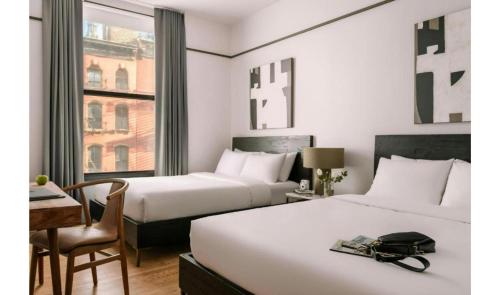 Guest Room, 2 Queen Bed, Non - Smoking del hotel Duane Street Hotel. Foto 5