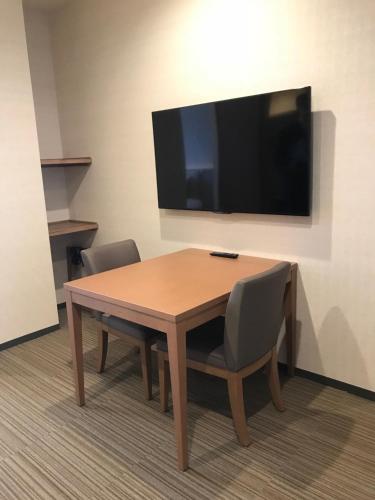 Suite with Two Single Beds and Refreshment Bar Access del hotel Holiday Inn and Suites Shin Osaka, An Ihg. Foto 4