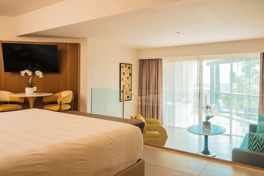 Suite, 1 cama de matrimonio grande con sofá cama (Pure Wellness Caribbean) del hotel Hard Rock and Casino Punta Cana All Inclusive. Foto 1