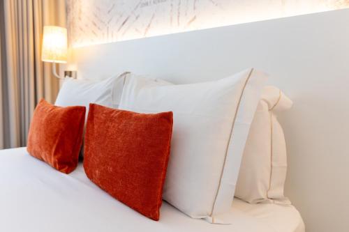 Habitación Doble Deluxe con balcón del hotel The Icons Lisbon Central. Foto 12