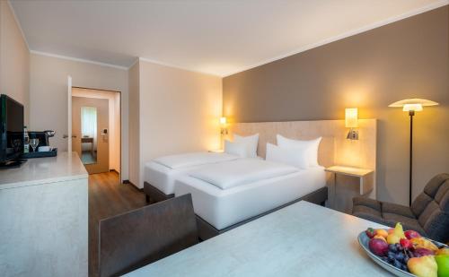 Habitación Doble Estándar - 2 camas del hotel Sunday Bielefeld Johannisberg. Foto 9