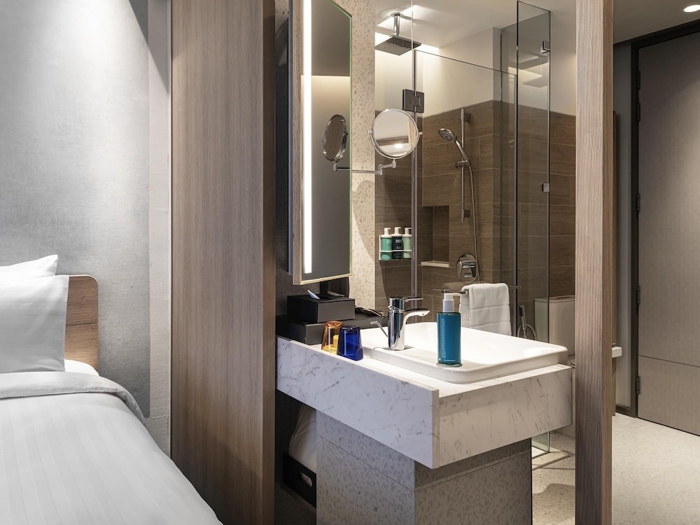 Habitación Deluxe Esquina 1 Cama King del hotel Novotel Bangkok Future Park Rangsit. Foto 4