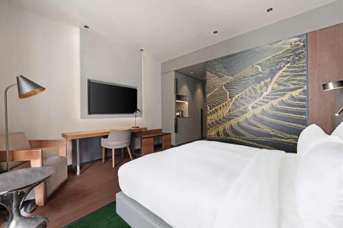 Habitación con cama extragrande - Adaptada para personas de movilidad reducida del hotel Hilton Porto Gaia. Foto 1