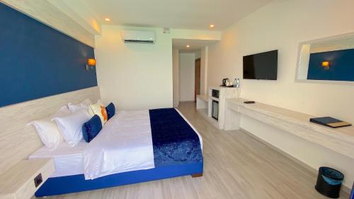 Habitación Doble Deluxe con vistas al mar y balcón del hotel Kaani Palm Beach. Foto 6
