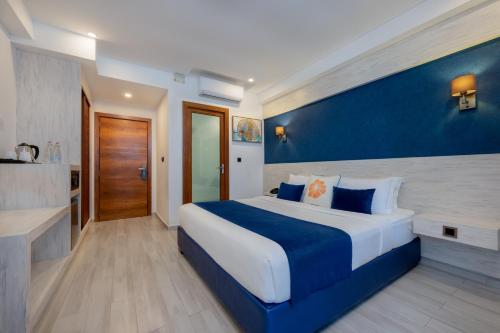 Habitación Doble Deluxe con vistas al mar y balcón del hotel Kaani Palm Beach. Foto 11