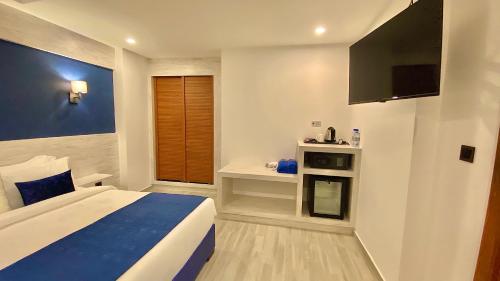 Habitación Doble Estándar (sin ventanas) del hotel Kaani Palm Beach. Foto 1