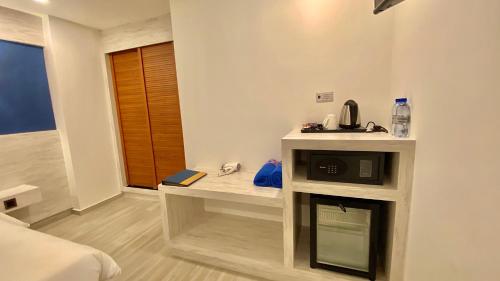 Habitación Doble Estándar (sin ventanas) del hotel Kaani Palm Beach. Foto 2
