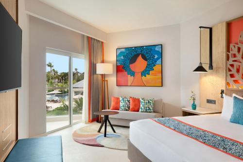 Alojamiento Preferred Club con vistas parciales al océano - 1 cama extragrande del hotel Dreams La Romana All-Inclusive Resort and Spa