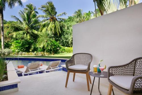 Alojamiento Preferred Club con vistas al jardín y acceso directo a la piscina - 2 camas grandes del hotel Dreams La Romana All-Inclusive Resort and Spa. Foto 2