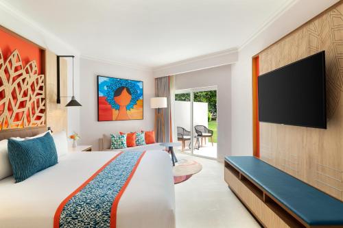 Habitación Premium con vistas al jardín - 1 cama extragrande del hotel Dreams La Romana All-Inclusive Resort and Spa