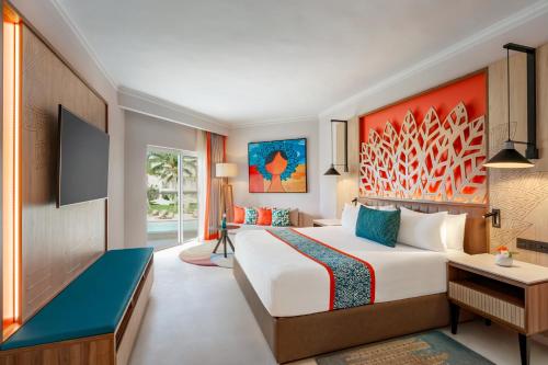 Alojamiento Preferred Club con vistas parciales al océano - 1 cama extragrande del hotel Dreams La Romana All-Inclusive Resort and Spa. Foto 1
