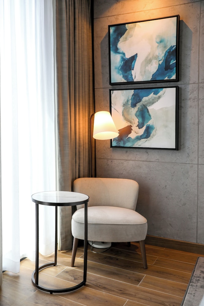Habitación Deluxe con 2 camas individuales del hotel Mercure Dubai Gold District. Foto 5