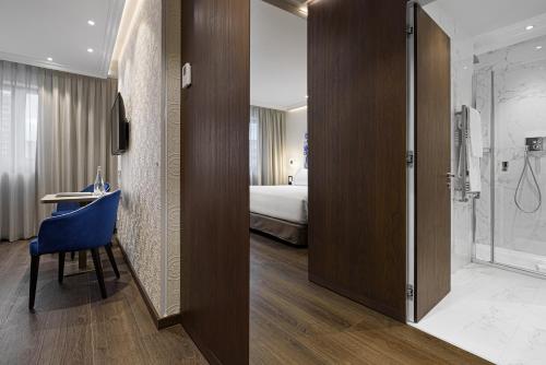 Habitación Doble Deluxe - 1 o 2 camas del hotel Eurostars Universal Lisboa. Foto 1
