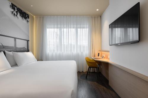Habitación Doble con vistas a la ciudad - 1 o 2 camas del hotel Ikonik Lisboa. Foto 1