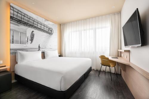 Habitación Doble con vistas a la ciudad - 1 o 2 camas del hotel Ikonik Lisboa. Foto 9