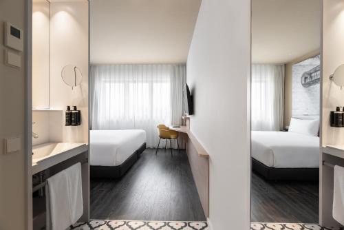 Habitación Doble con vistas a la ciudad - 1 o 2 camas del hotel Ikonik Lisboa. Foto 11