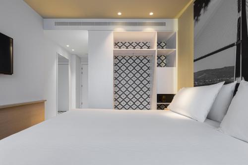 Habitación Doble Deluxe con vistas al río - 1 o 2 camas del hotel Ikonik Lisboa. Foto 1