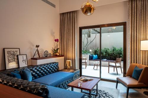 Apartamento de 1 dormitorio con patio del hotel DoubleTree by Hilton Dubai M Square Hotel and Residences. Foto 4