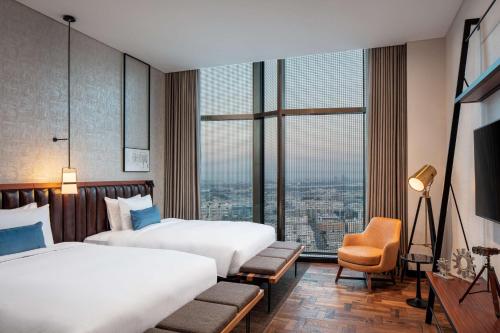 Habitación Doble - 2 camas del hotel DoubleTree by Hilton Dubai M Square Hotel and Residences