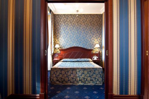 Habitación Triple Superior del hotel Best Roma. Foto 4