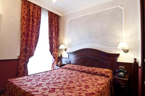 Habitación Individual Superior del hotel Best Roma. Foto 3