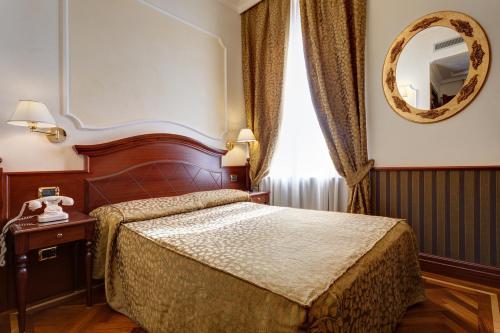 Habitación Doble Pequeña del hotel Best Roma. Foto 1