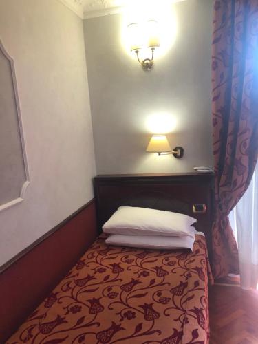 Habitación Individual Estándar del hotel Best Roma. Foto 4