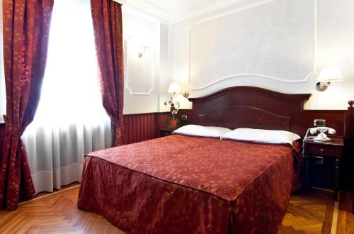 Habitación Doble Estándar del hotel Best Roma. Foto 2