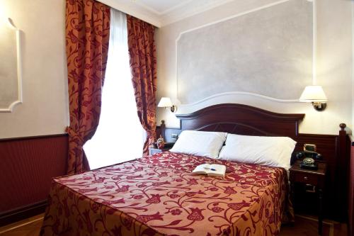 Habitación Doble Estándar del hotel Best Roma. Foto 3
