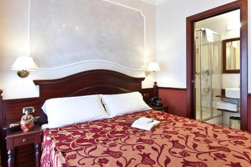 Habitación Doble Estándar del hotel Best Roma. Foto 4