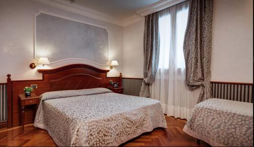 Habitación Triple Estándar del hotel Best Roma