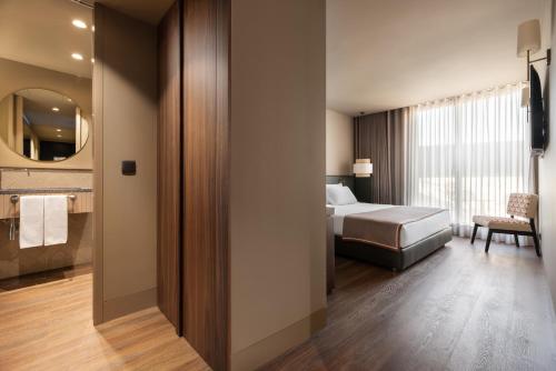 Suite Junior del hotel Exe Essenzia Porto. Foto 7